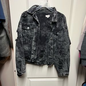 Distressed acid wash denim jacket